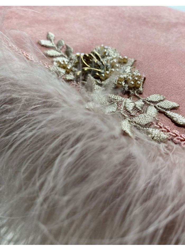 Sac à main rose foncé avec plumes