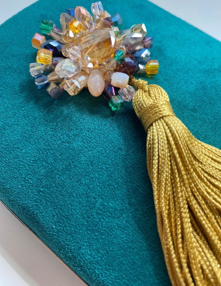 Bottle green handbag with crystal embellishment