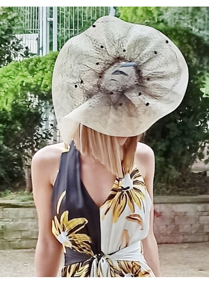 White headdress with black details.