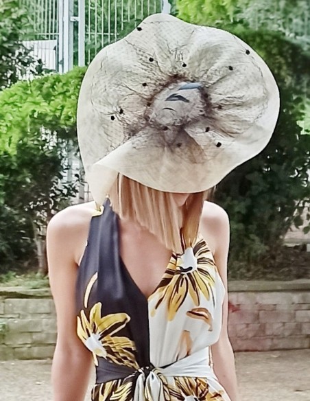 White headdress with black details.