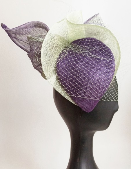 Raffia headpiece with details in two colors.