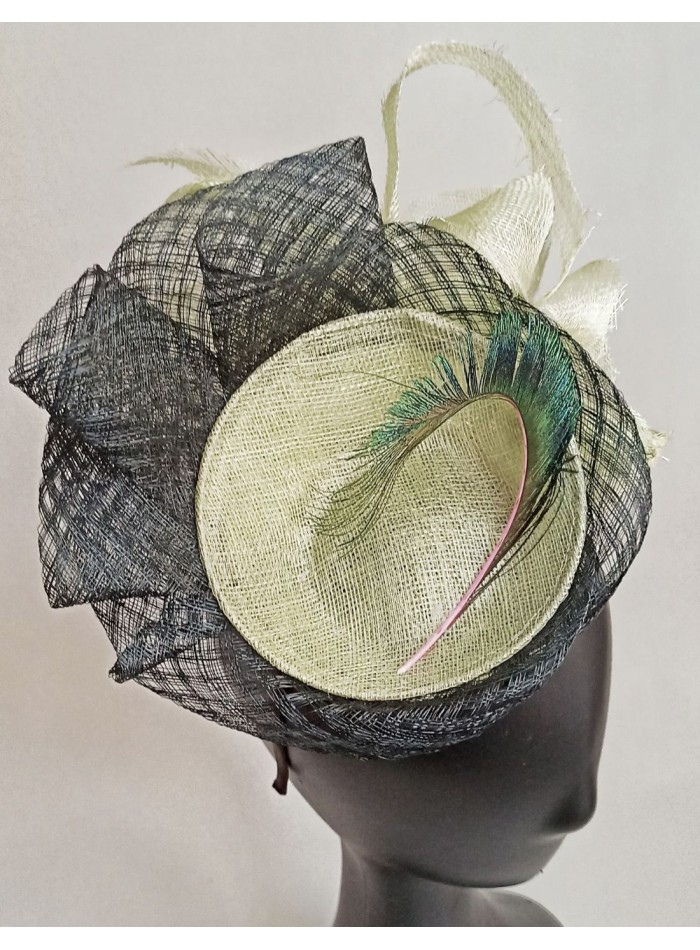 Headdress in green and navy blue.