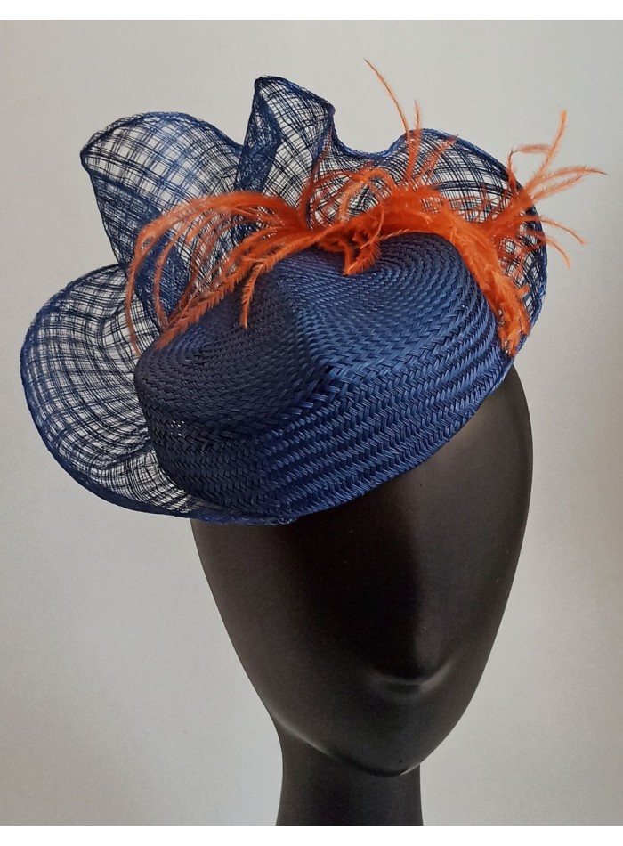 Handmade curved headdress with orange feathers.