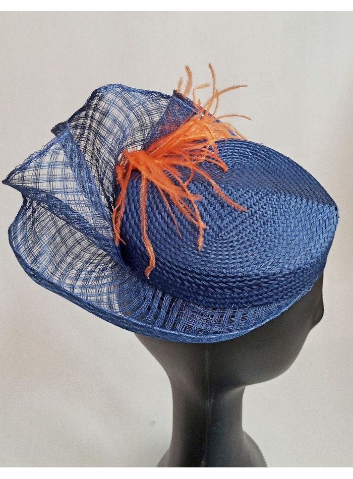 Guest headdress with sinamay brim.