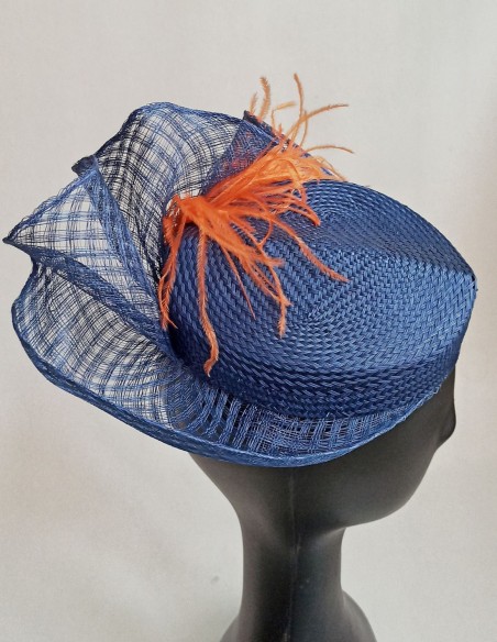 Guest headdress with sinamay brim.