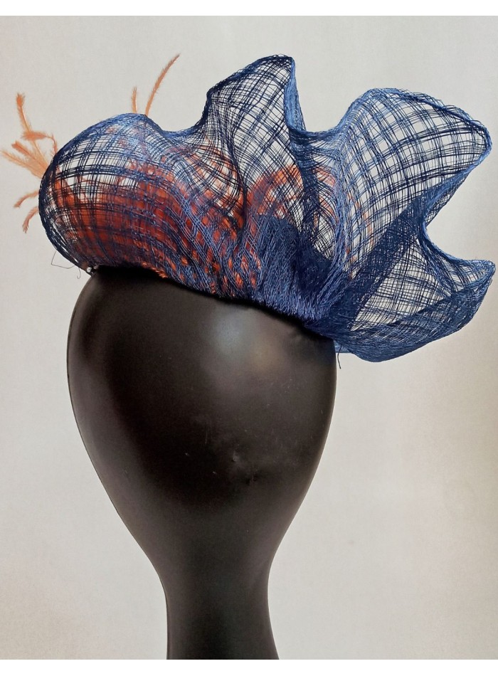 Blue pillbox type guest headdress.