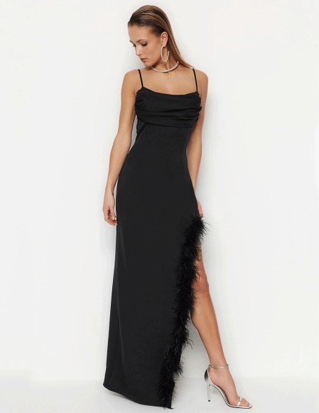 Black evening dress with feathered slit