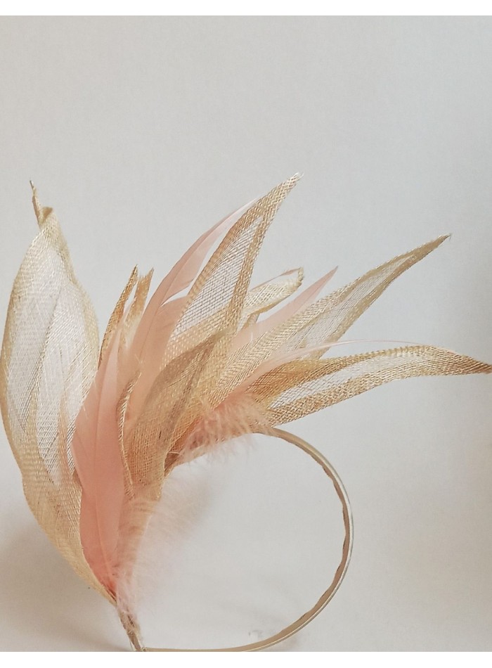 Intertwined raffia leaves and feathers headpiece.