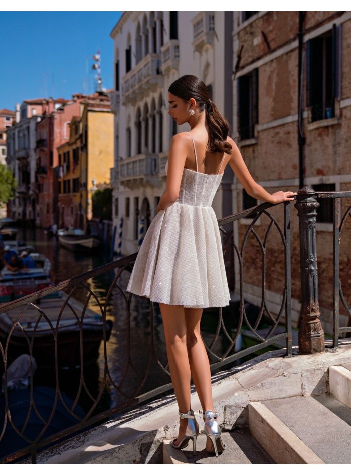 Shiny mini dress with flared skirt