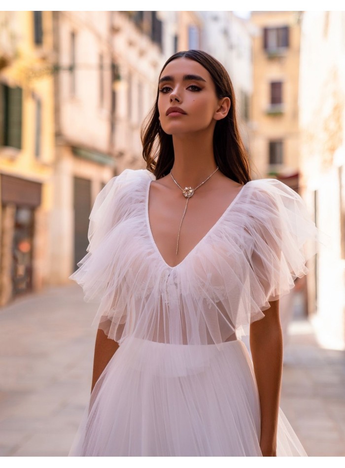 Vestido midi de fiesta con volantes de tul