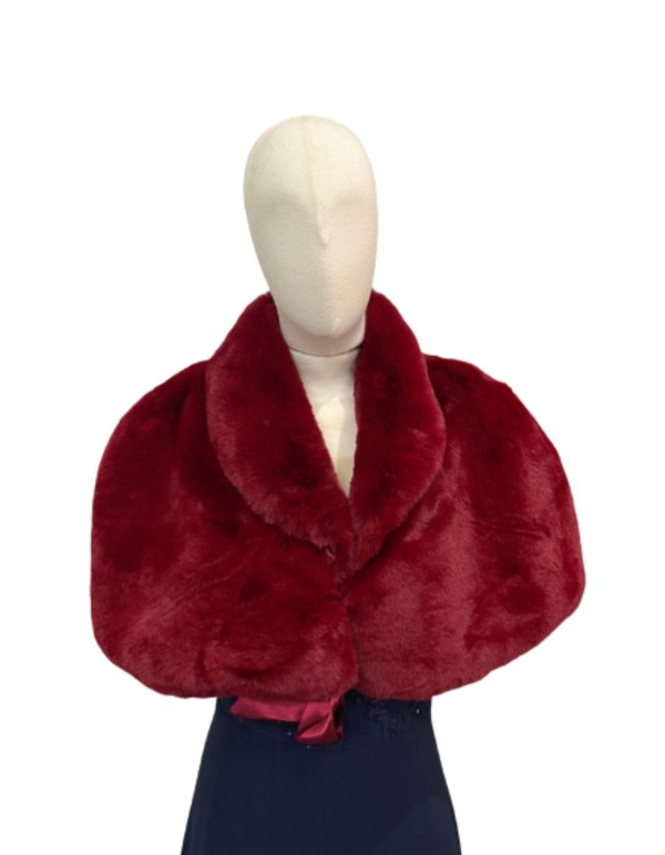 Haut bordé de fourrure avec laçage