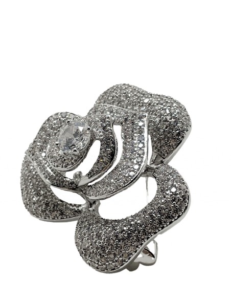 Round silver plated brooch with leaf-shaped crystals