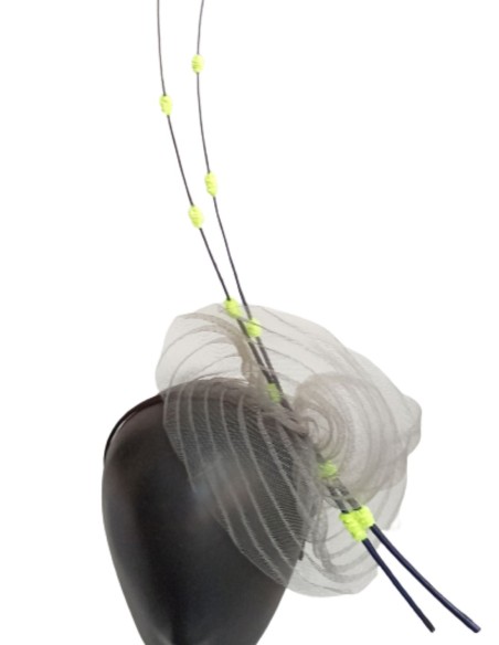 Transparent and pleated headdress for guests.