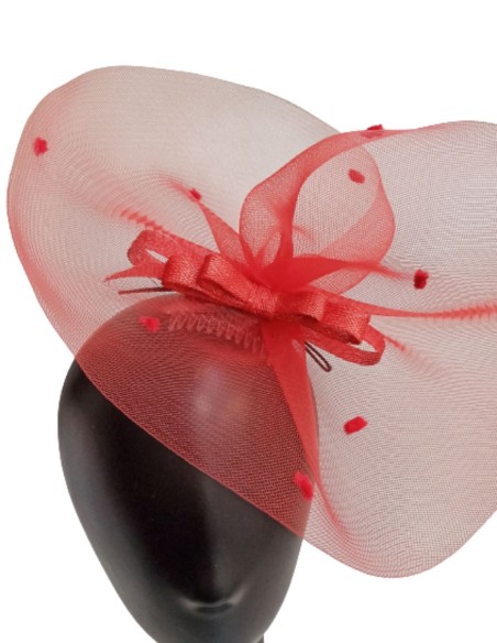 Red headdress with plumeti dots and bow.