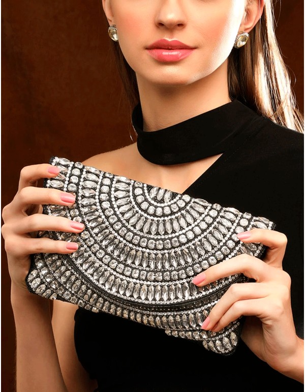 Black evening clutch bag with white crystals