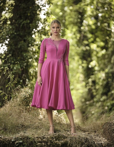 Cocktail dress with sheer bodice and flared skirt