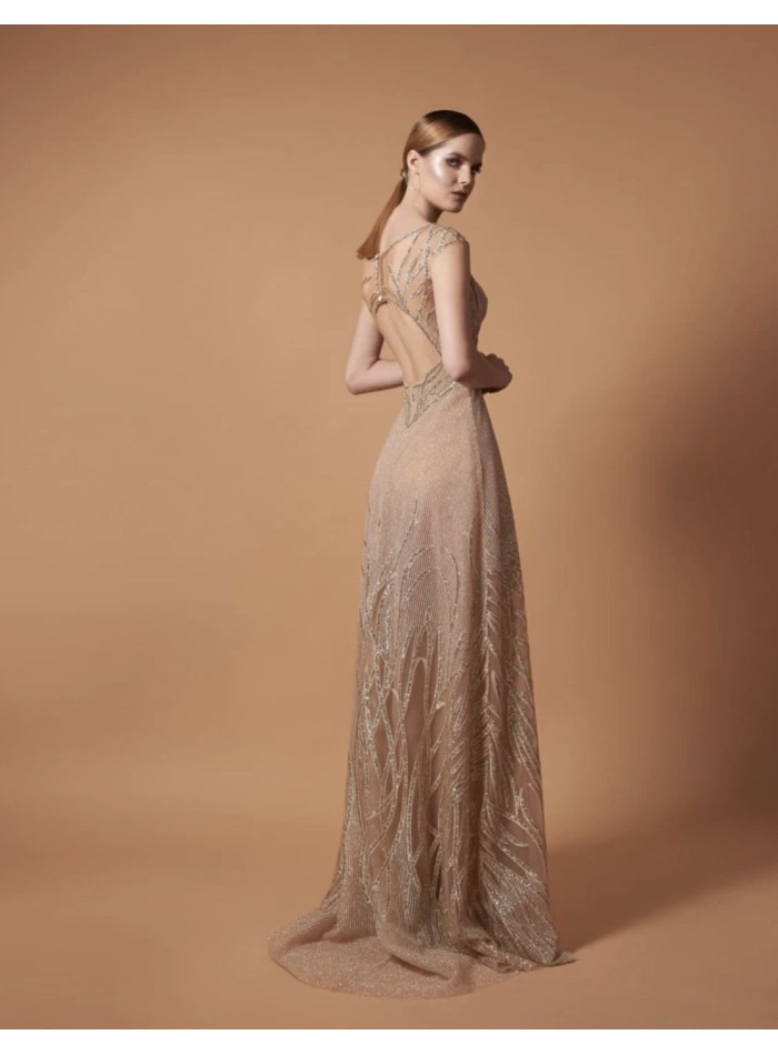 Vestido largo de fiesta dorado con pedrería