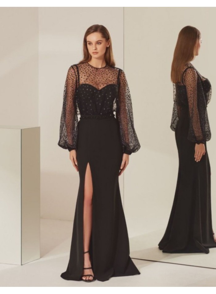 Long black evening dress with shoulder straps and side slit