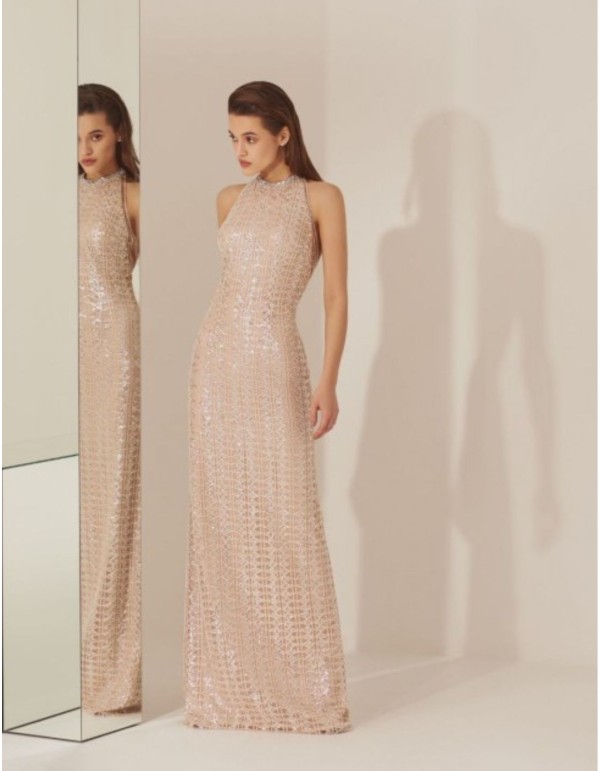 Robe de soirée décolletée à l'encolure dos nu en sequin...