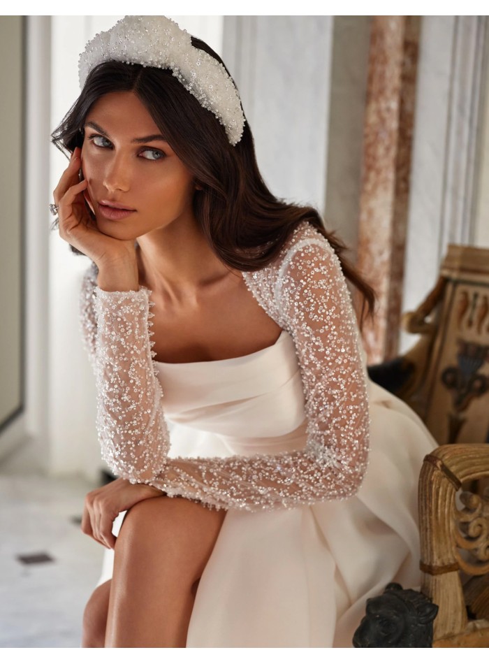 Long wedding dress with straight neckline and...
