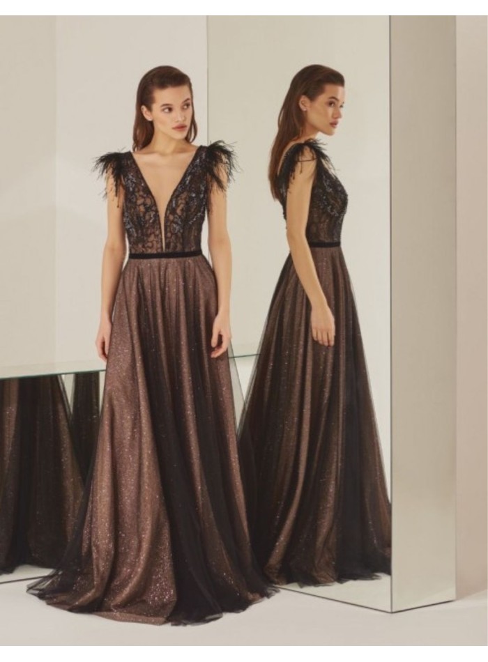 Long black party dress in tulle with feathers on the shoulders