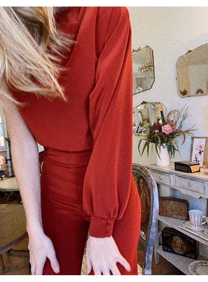 Smooth tile body with asymmetric sleeves and...