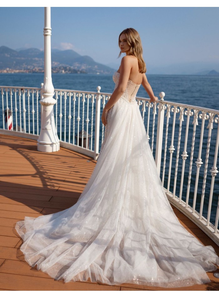 Rhinestone strapless wedding dress with...