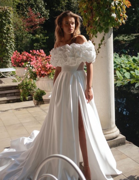 Long wedding dress with floral neckline and detachable train