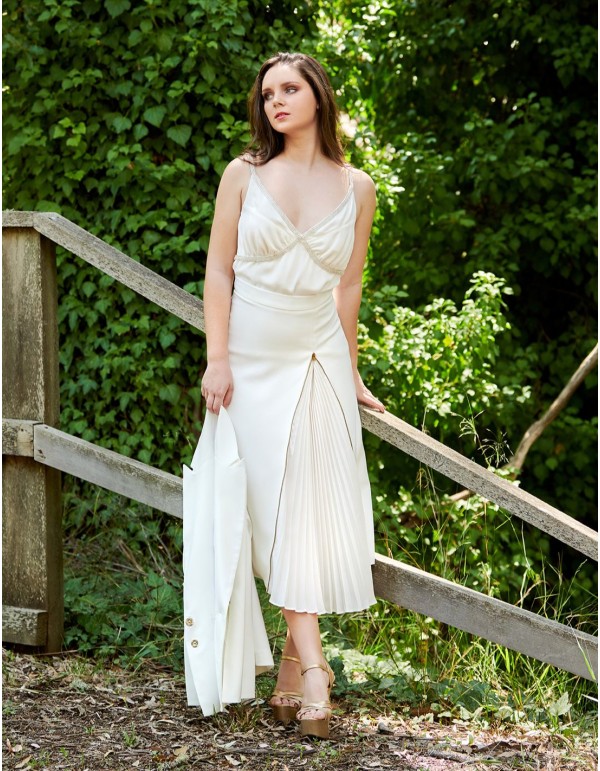 White pleated midi skirt.