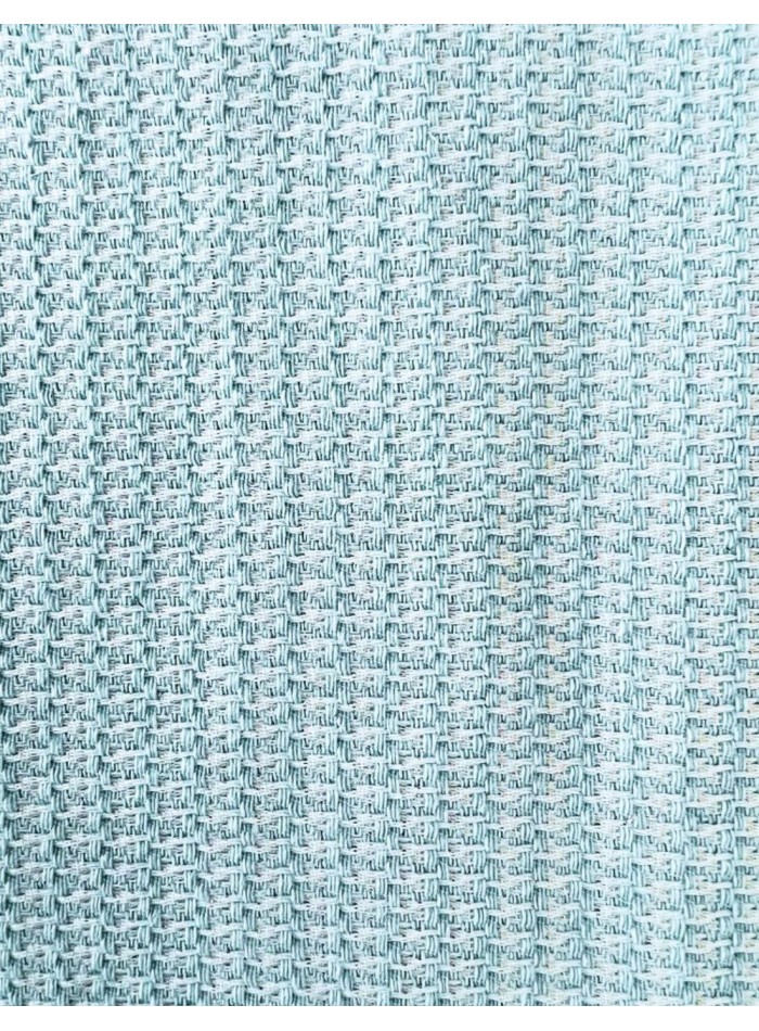 Short jacket with tweed fabric and golden buttons.