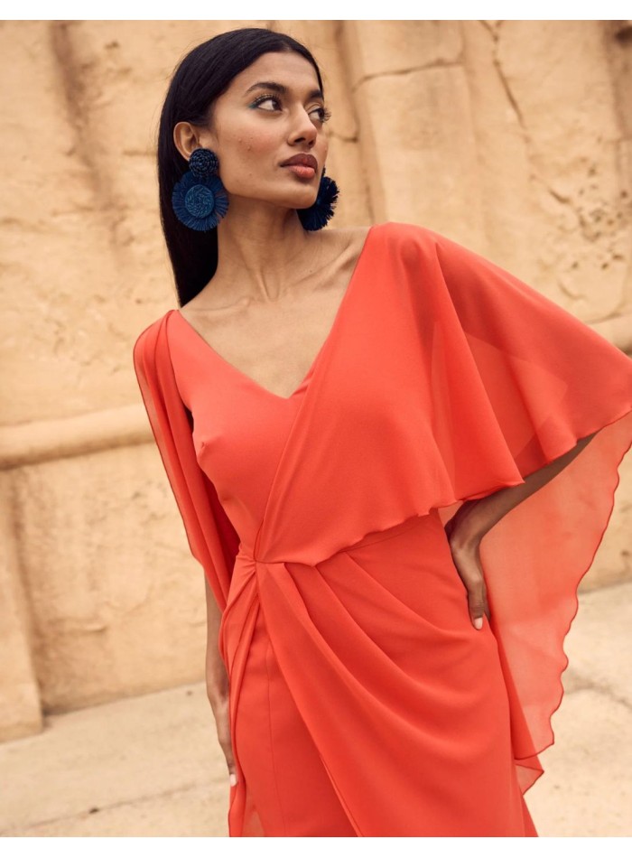 Party dress with slit in the skirt.