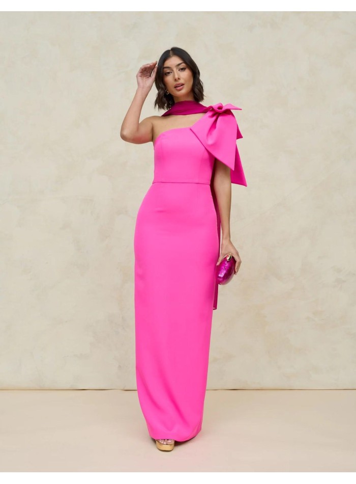 Long pink party dress with asymmetric neckline.