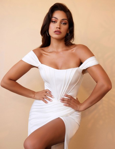 Long party dress with bare shoulders.