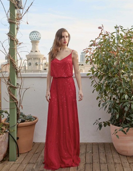 Vestido de fiesta largo de pedrería y escote en la espalda