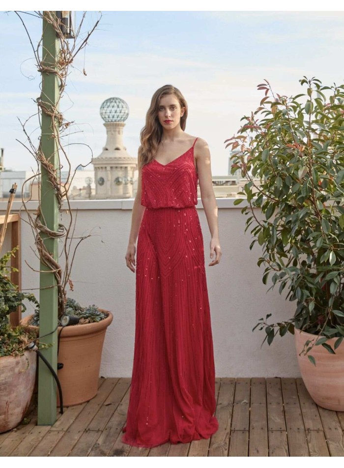 Robe longue de fête avec perles et décolleté...