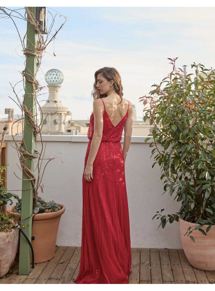 Robe longue de fête avec perles et décolleté...