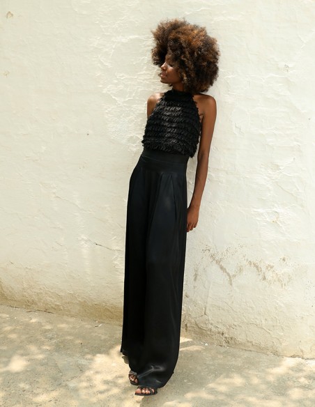 Mono de fiesta con top de minivolantes y pantalón palazzo color negro