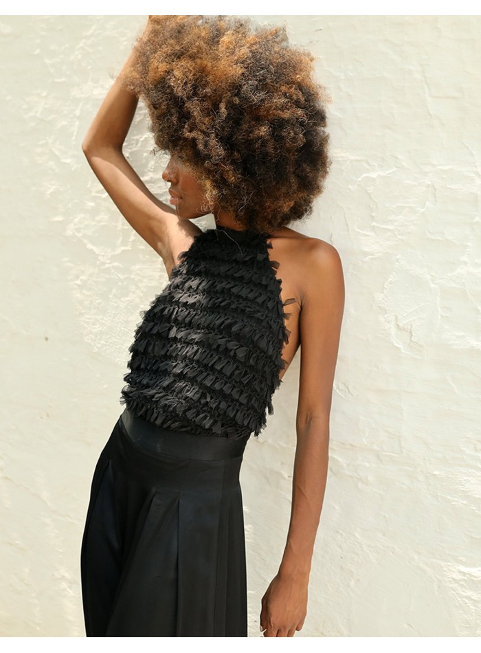 Mono de fiesta con top de minivolantes y pantalón palazzo