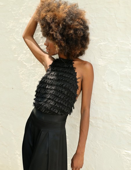 Mono de fiesta con top de minivolantes y pantalón palazzo