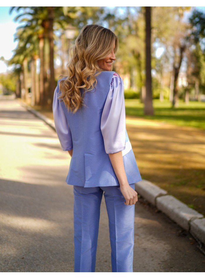 Sleeveless silk vest with lined pockets and...