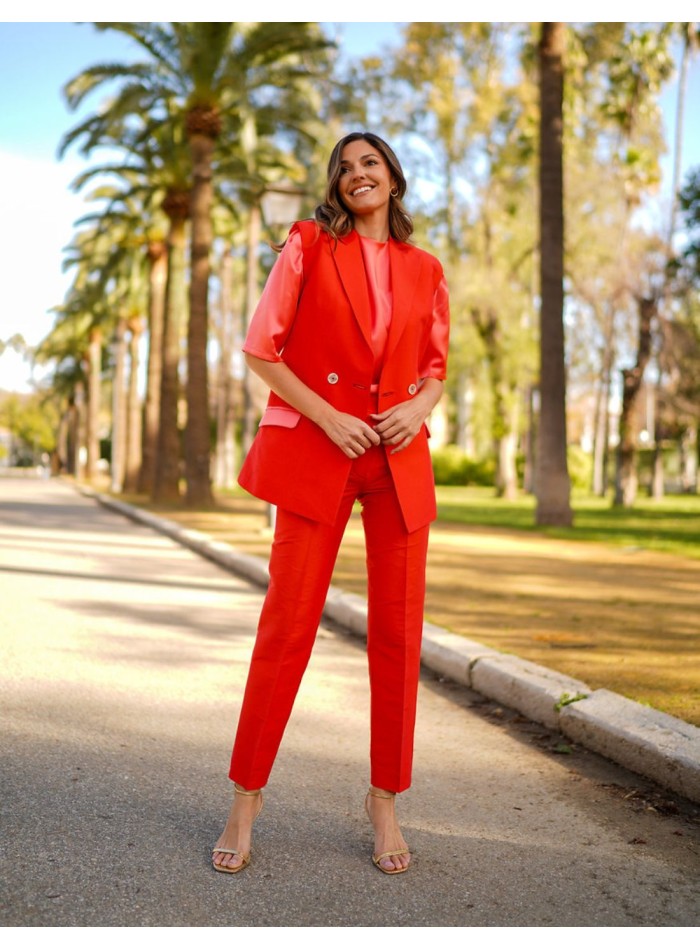 Orange silk vest with buttons and lined pockets