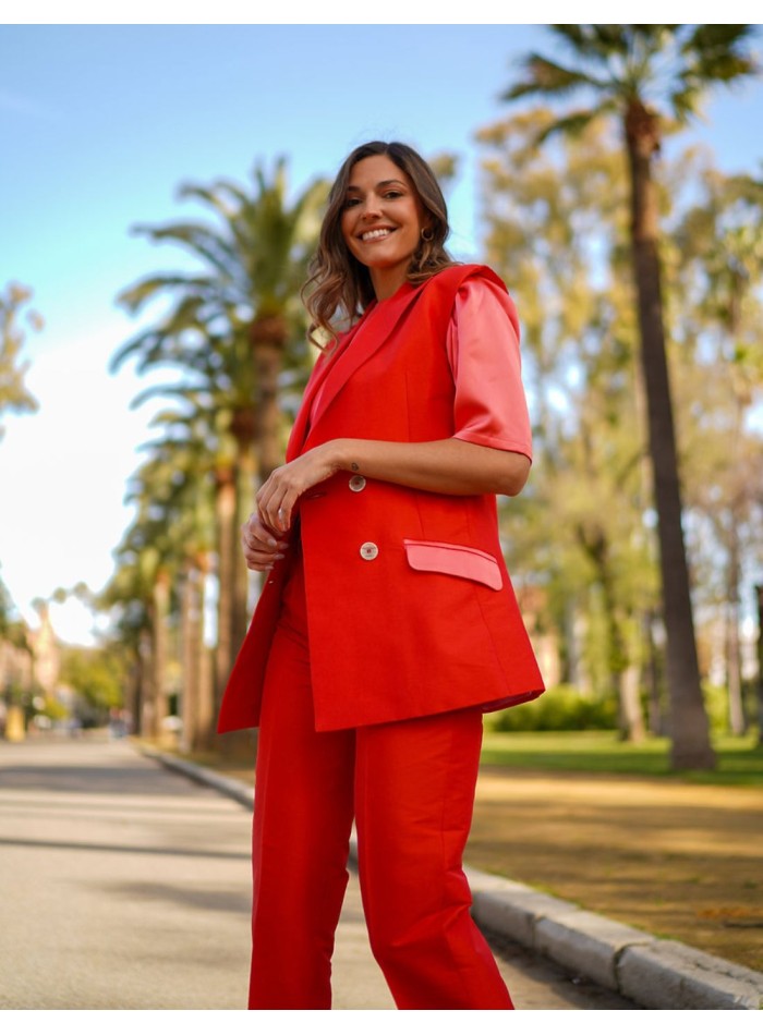 Orange silk vest with buttons and lined pockets