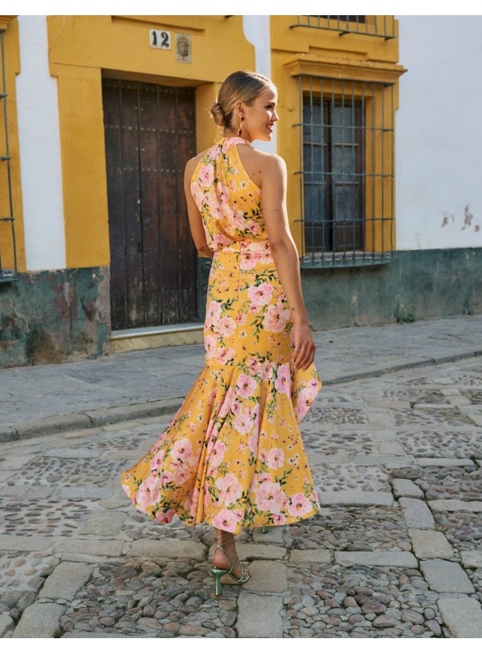 Falda midi estampada con corte drapeado y volante