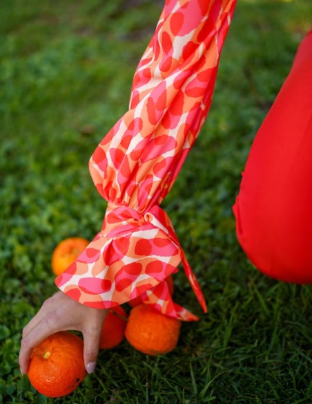 Blusa de fiesta estampada de manga larga con lazada