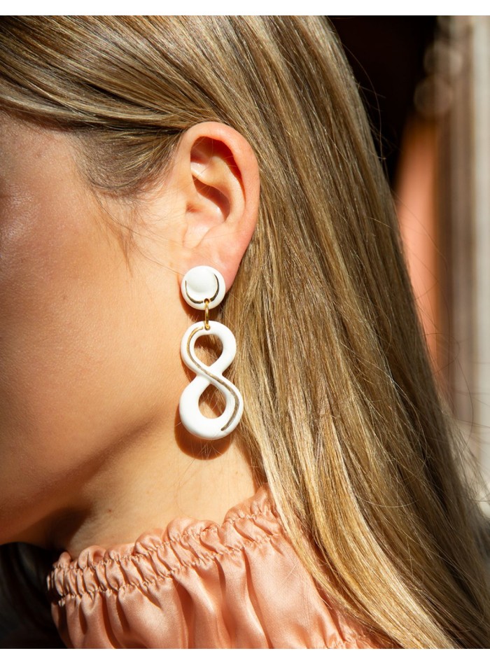 Boucle d'oreilles longue en porcelaine et...