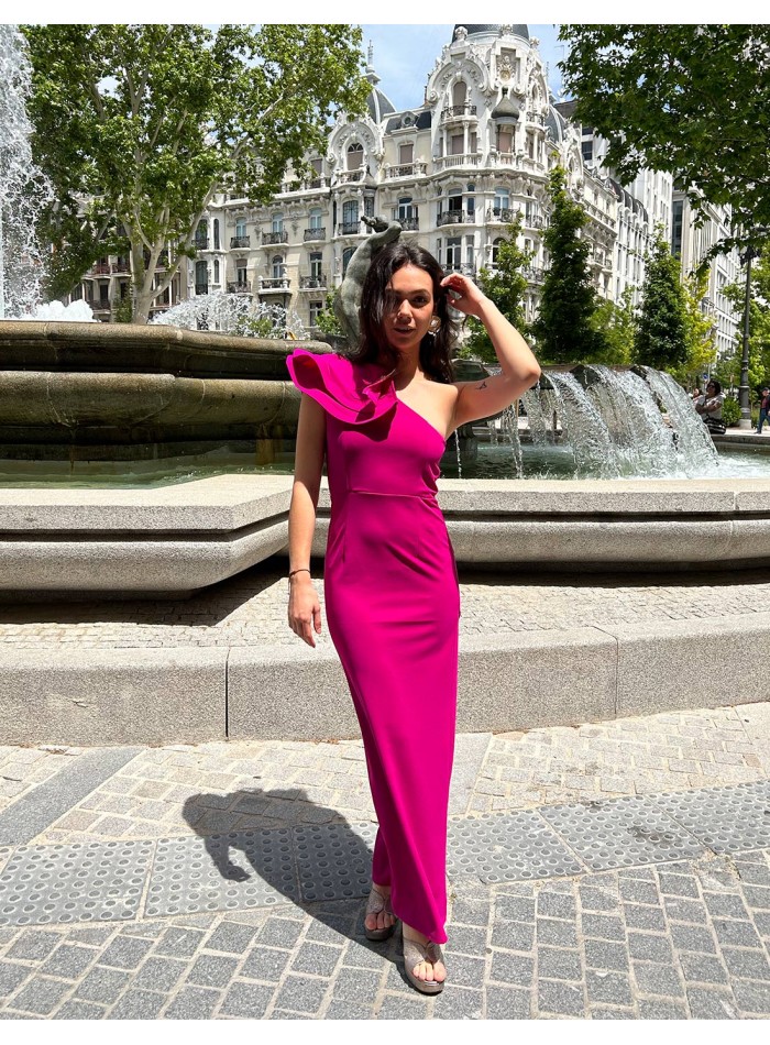 Long gown with asymmetrical neckline and flounce