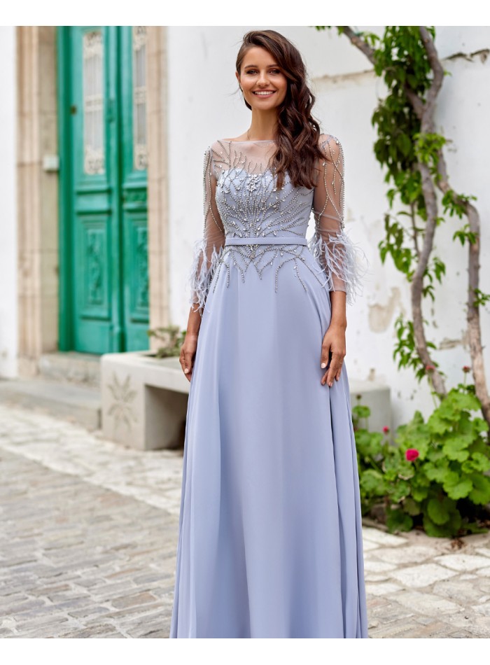 Long party dress with feather appliqués and rhinestones