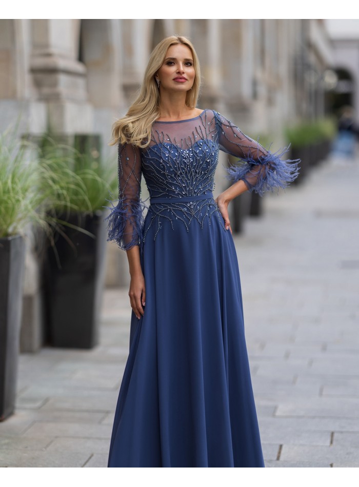 Long party dress with feather appliqués and rhinestones