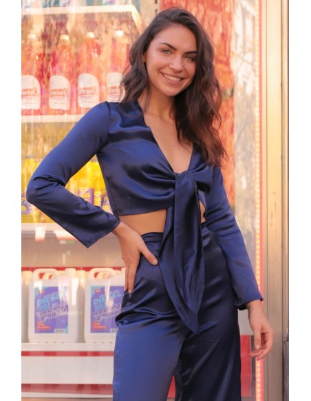 Navy blue satin blouse with knotted neckline and long sleeves