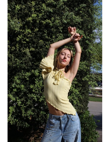 Yellow party top with asymmetric neckline and long sleeves